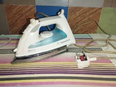 steam iron made in Germany 100 % working 
just like brand new