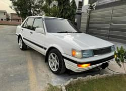 Toyota corolla 86 GL saloon with lots of modifications 
After market