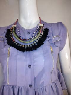 Vibrant Art-inspired Ensemble with Statement Necklace