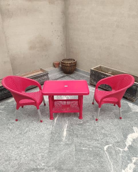 2 Plastic Kids chairs , 1 Table set 12