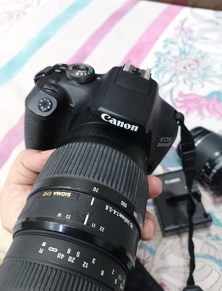 Canon 2000D with two lenses 0