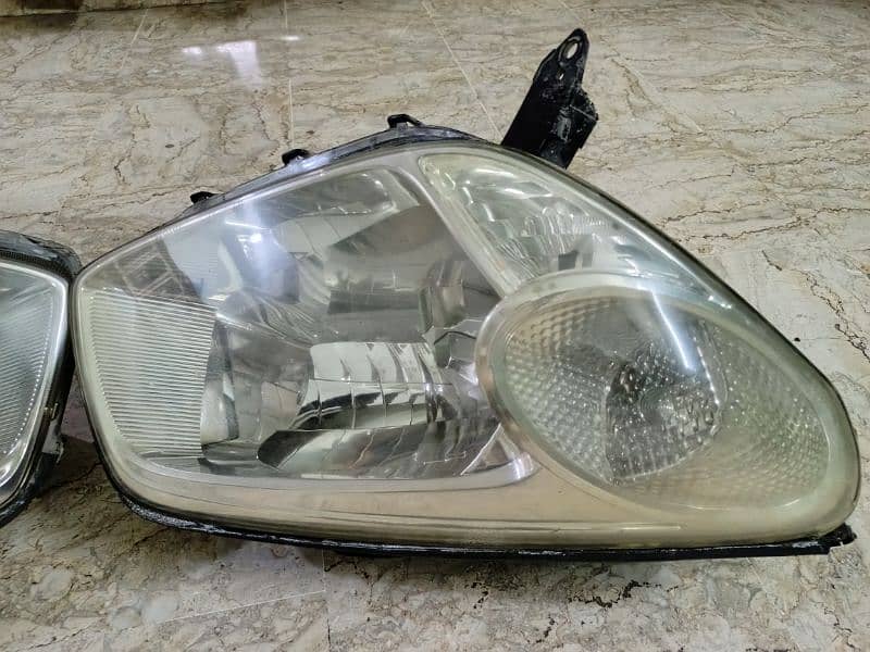 Rav 4 2003, 2004 and 2005 original company fitted HID head lights 1