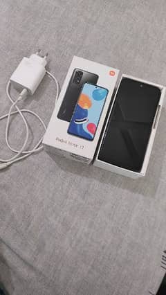 Xiaomi Redmi Note 11 box and charger