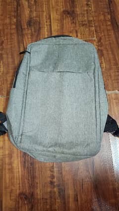 grey backpack single zipper