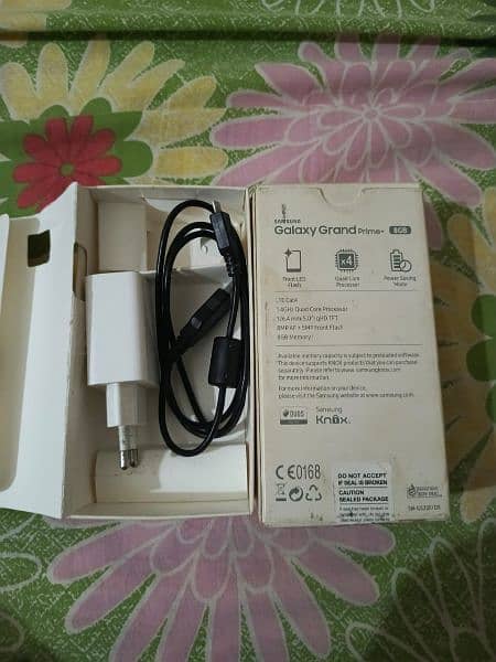 Samsung Galaxy grand prime+ with box and charger 2