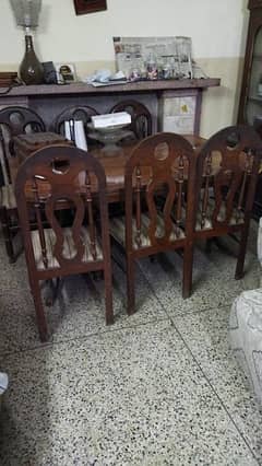 wooden dinning table with chairs