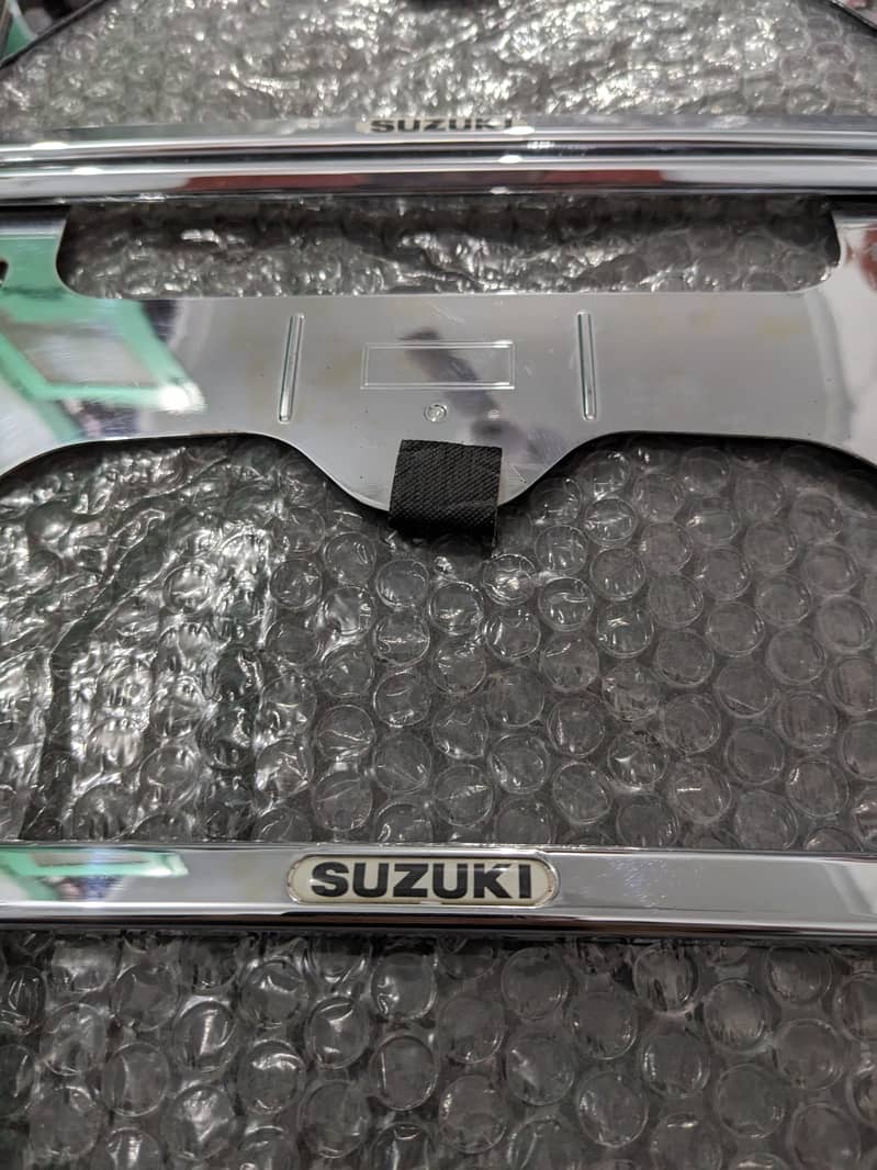 JDM Suzuki genuine license plate frames for sale 1