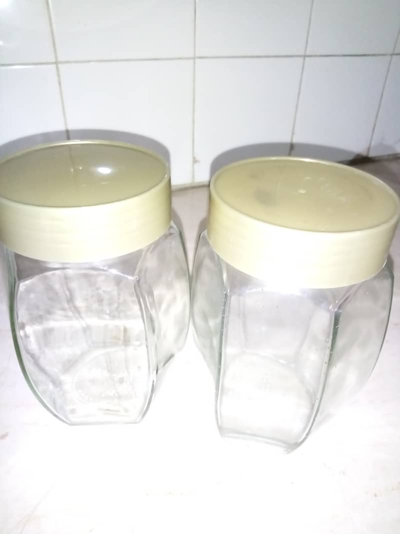 Glass jars with plastic lids 1Kg (Rs. 300 per pair) 0