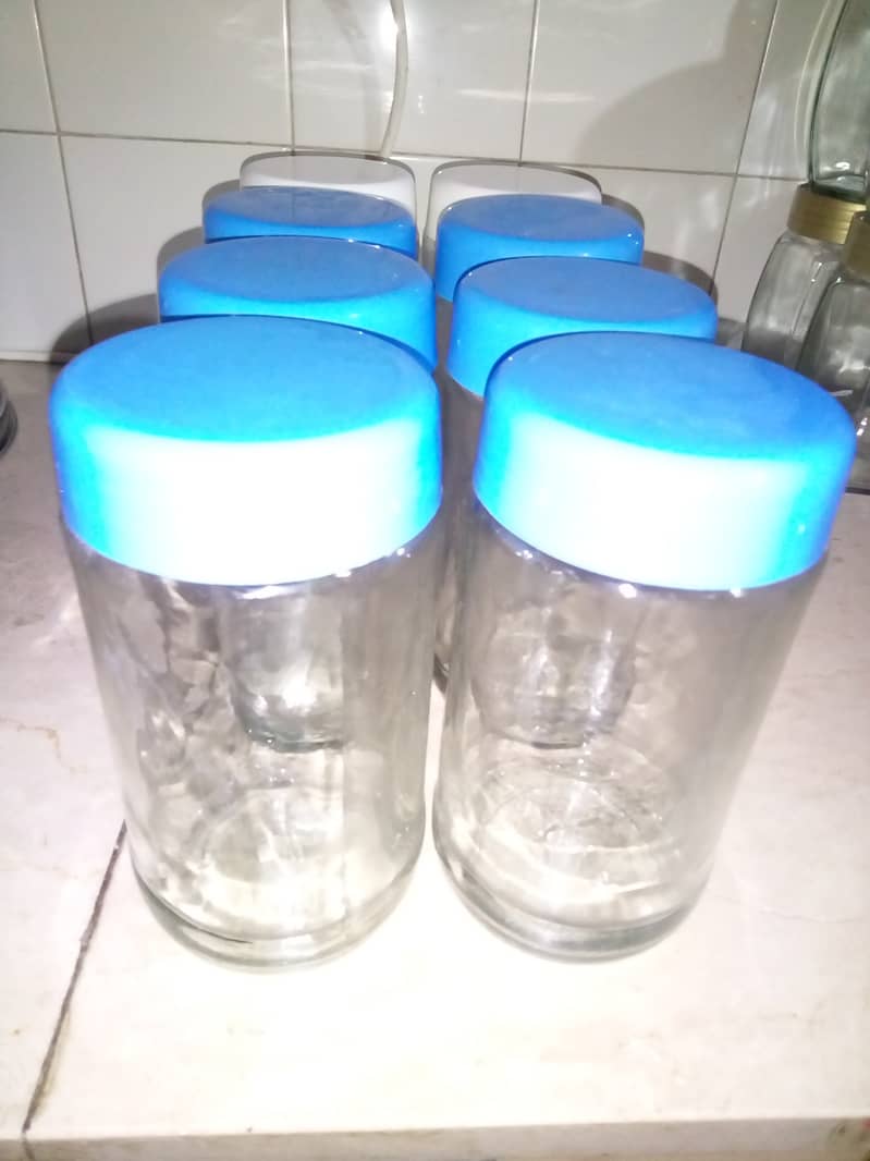 Glass jars with plastic lids 1Kg (Rs. 300 per pair) 2