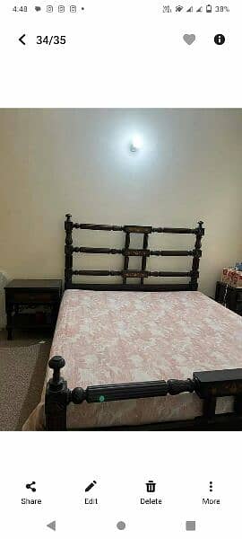 wooden bed in very good condition with 2 drawas 0