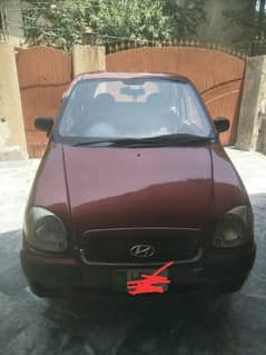 Hyundai Santro club 2003 efi better than Mehran cults alto coure