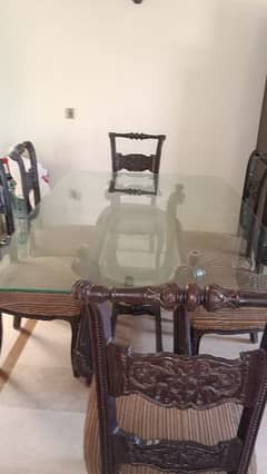 glass dining table with 6 chairs