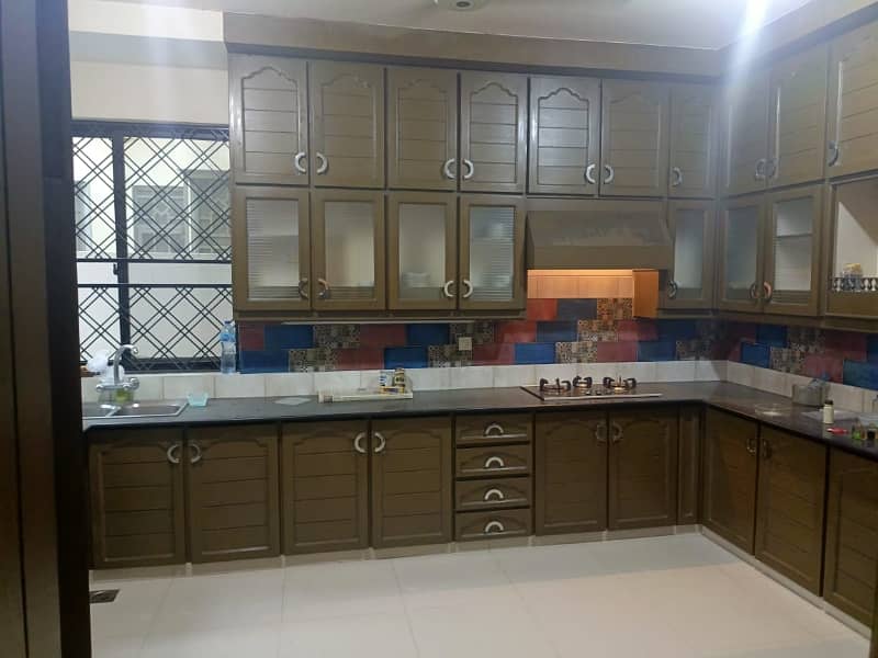 1 Kanal Tile Flooring 65ft Road Outclass House For Rent In Johar Town J-2 Block 13