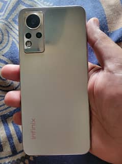 Infinix Note 12 6gb 128gb complete box side par halka sa dent hai