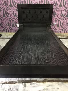 Black  cushioned wooden single bed with spring 8 inch spring mettress.