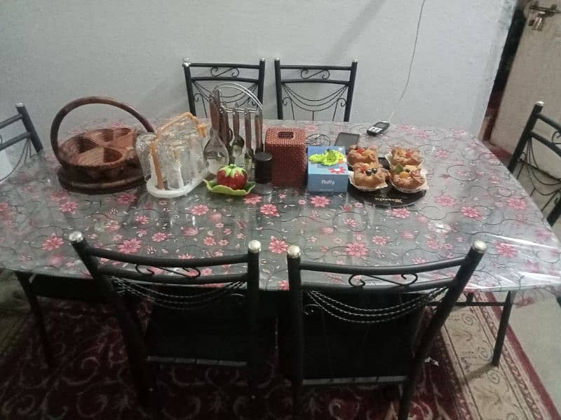glass table with six chairs 1