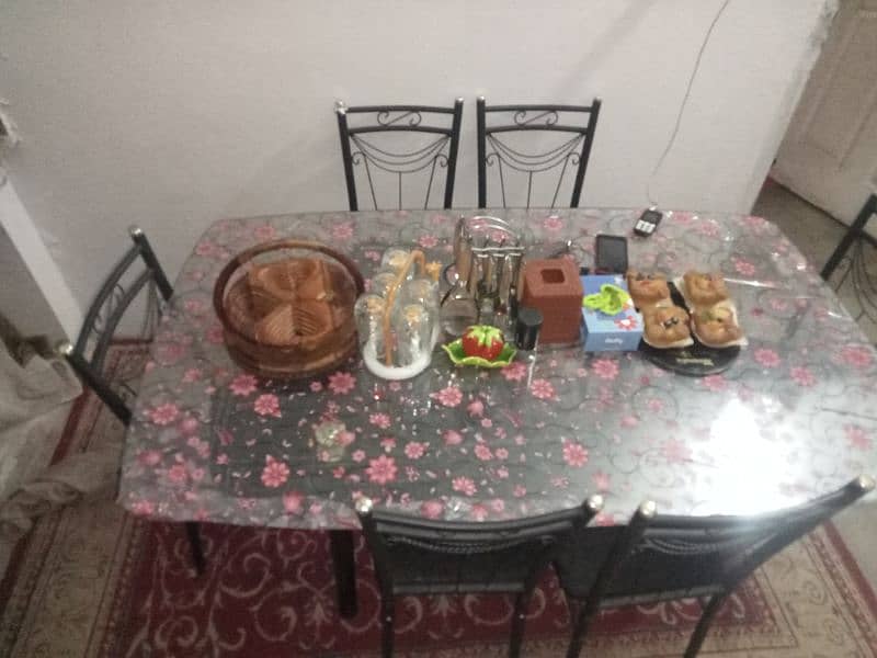 glass table with six chairs 2