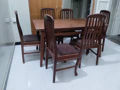 Wooden dining table with 6 chairs 0