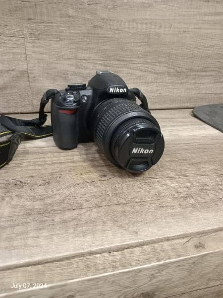 nikon d3100 with 18/55 lens and Bag 1