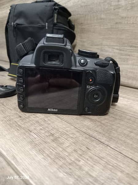 nikon d3100 with 18/55 lens and Bag 2