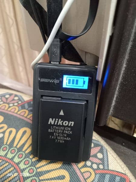 nikon d3100 with 18/55 lens and Bag 3