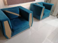 sea green colour 9 seater sofa set alongwith centre table