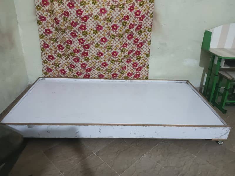 Single wooden bed for sale 0