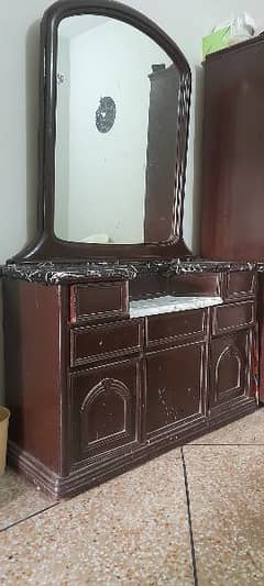 Used hard wooden dressing table with stule with 2 site tabels