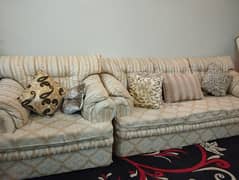 7 seater sofa set with tables in good condition.