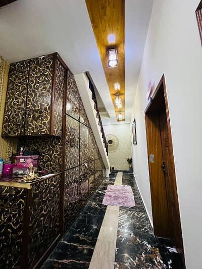 Designer 9 Marla House With Full Basement Is Available For Sale In Nea