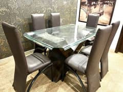 Custom wooden and glass top dinning table with 6 chairs