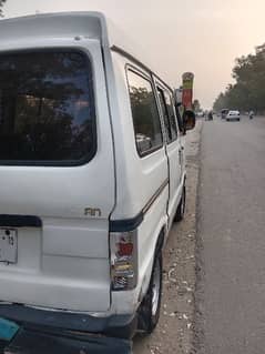 Suzuki Bolan Carry Daba 2010 model lahore number