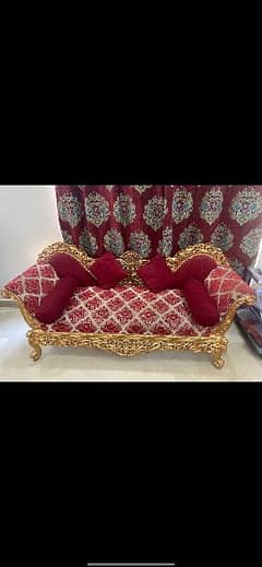 Red Deewan with cushions