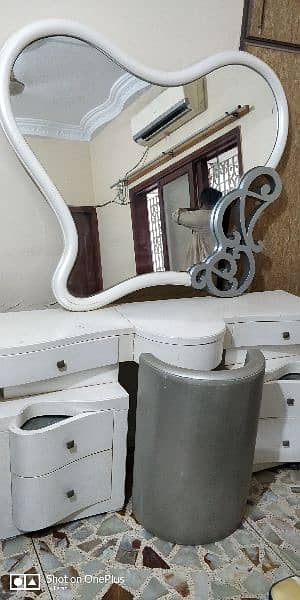 Dressing table with big size fancy mirror and a puffy chair 4