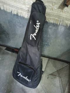 yamaha accoustic guitar with fender bag