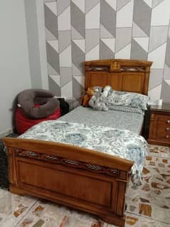 2 Single Beds Orignal Shisham wood Beds and 1 Side Table Available.