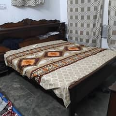 king size bed attached with siders