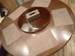 chocolate brown dining table , with table mats