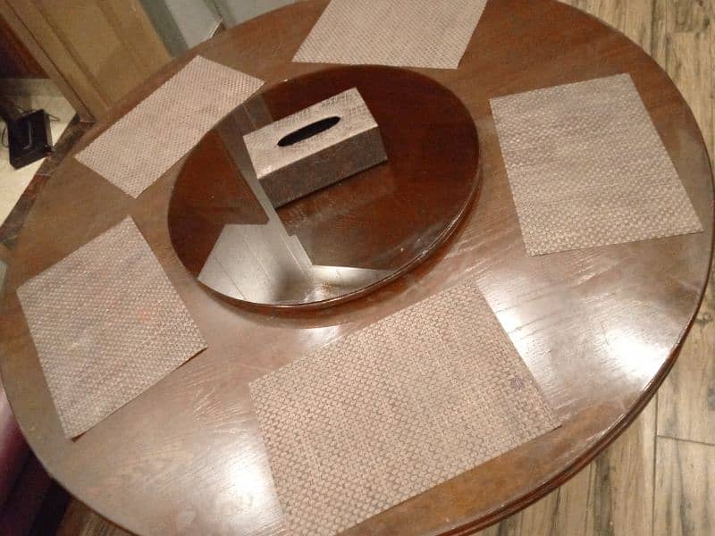 chocolate brown dining table , with table mats 0