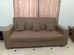 Seven seater sofa with center and two coffee tables