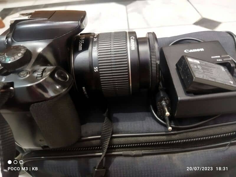 camera Canon 1300d with original charger 8