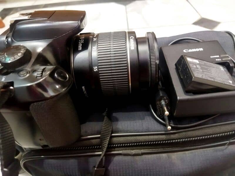 camera Canon 1300d with original charger 9