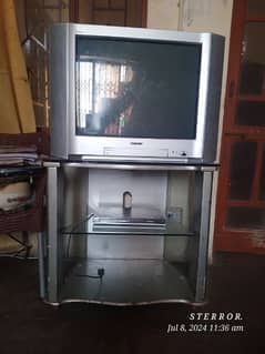 Sony TV 24 inch with matching trolly?+cd player free