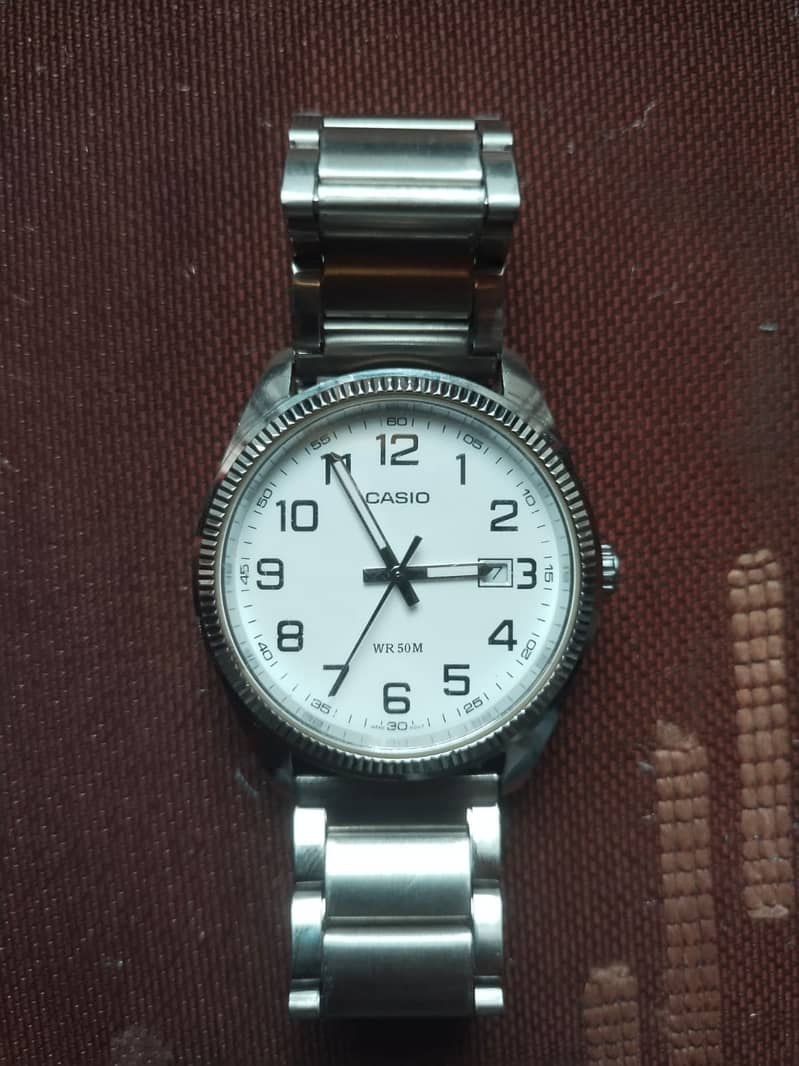 Casio white dial watch in A+ condition 0