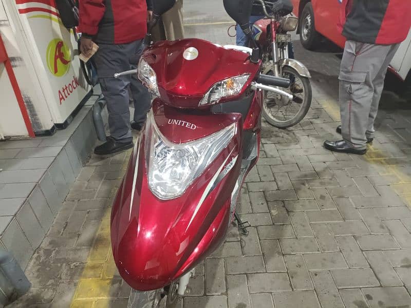 United 100 cc scooty 9