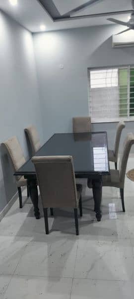 dinning table with 6 chairs for sale very good condition slightly used 1
