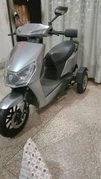 Four Wheels Electric Scooty or E Bike For Spacial Persons 1