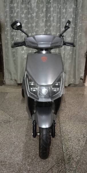 Four Wheels Electric Scooty or E Bike For Spacial Persons 2