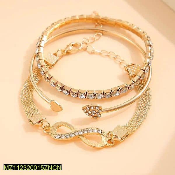 ladies bracelets / jewellery item / set of 3 golden bracelets 1