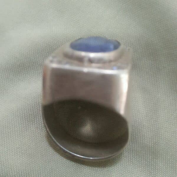 neelam stone and 12 gram silver ring. 1